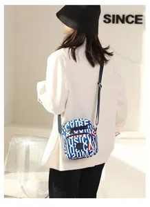 Trendy women nylon crossbody bag with letter print, casual lightweight shoulder bag for daily use.