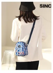 Blue and white printed nylon crossbody bag for women, casual mini shoulder bag style.