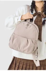 Casual canvas backpack for women, lightweight small daypack for travel, outdoor and daily school use.