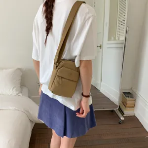 Minimalist casual canvas crossbody phone bag for women, versatile small shoulder bag, khaki.