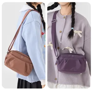 Lightweight women's crossbody shoulder bag, versatile multi-layer oxford cell phone bag.