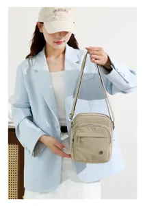 Casual nylon crossbody bag for women, lightweight multi-pocket daily shoulder bag for travel.