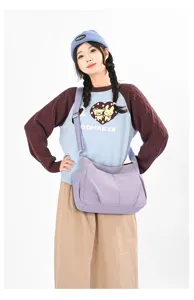 Lightweight purple nylon crossbody bag with multi-pockets, casual shoulder bag for daily use.