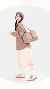 Detailed view of large capacity nylon shoulder bag for women, casual crossbody design.
