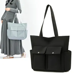 Large capacity nylon tote bag for women, stylish commuting shoulder bag with multi pockets.