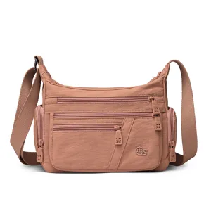 Stylish casual nylon shoulder bag for women, multi-pocket crossbody bag with spacious capacity.