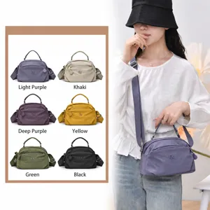 Casual multi-layer crossbody bag for women, lightweight versatile shoulder bag with top handle.