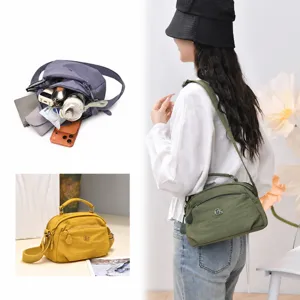 Versatile women's casual crossbody bag with multi-layer pockets, stylish shoulder bag for daily use.