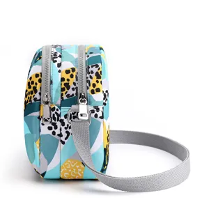 Women's mini oxford crossbody bag, casual printed multi-zipper shoulder bag for daily use.