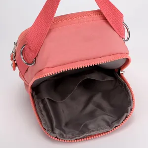 Pink oxford cloth crossbody shoulder bag, lightweight multi-pocket casual daily handbag for women.