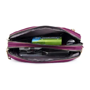 Nylon crossbody bag for women, multi-compartment travel shoulder bag with zip pockets.