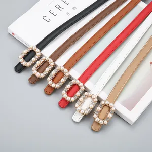 Slim leather belt for women with elegant pearl rhinestone buckle, chic dress accessory.