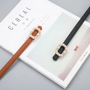 Women slim leather belt with elegant pearl rhinestone buckle, chic black and brown casual waist.