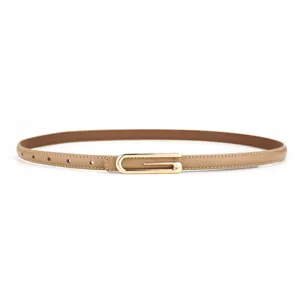 Detailed view of women's thin leather belt featuring a sleek metal buckle and fine stitching.