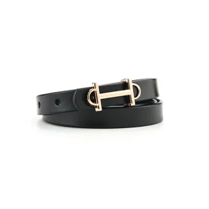 Close-up detail of the black leather belt with exquisite gold-toned metal buckle design.