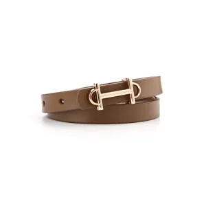 Slim brown leather belt with elegant gold buckle, perfect detail shot for women's fashion wear.