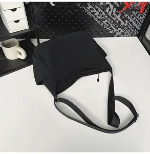 Black nylon crossbody bag, large capacity casual shoulder bag for students daily use.