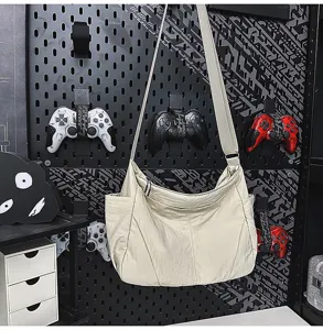 Large capacity nylon crossbody shoulder bag for women, lightweight casual neutral tote bag design.
