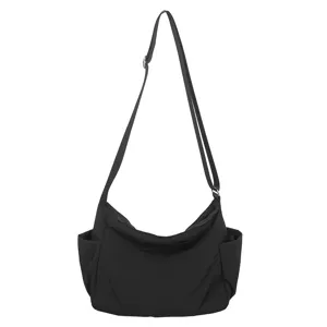 Casual black nylon crossbody bag with adjustable strap and side pockets, large capacity main view.