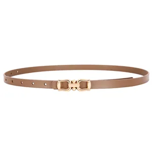 Women's slim brown leather belt with gold metal buckle, stylish dress accessory for waist.