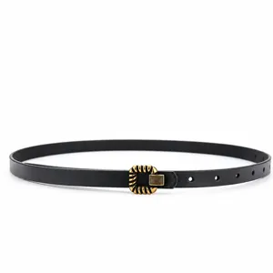 Women black thin leather dress belt with vintage gold buckle for waist shaping and fashion.