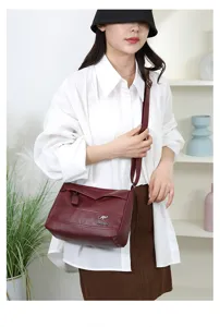 Detail view of a stylish women soft leather shoulder crossbody bag featuring casual travel design.