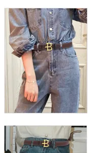 Women brown leather belt detail close-up, stylish golden letter B buckle for jeans and dresses.