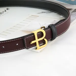 Women's leather belt with gold B buckle dark brown textured strap designer style high-end fashion accessory