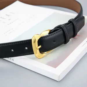 Minimalist black leather belt for women, featuring a chic gold buckle, versatile accessory.