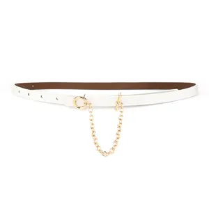 White slim leather belt detail with gold O-ring and chain, minimalist fashion accessory.