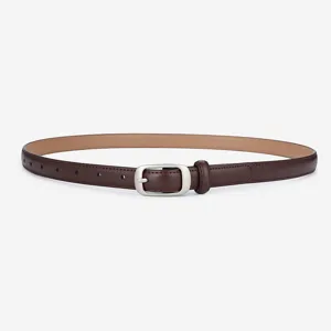 Minimalist women's brown leather belt with silver pin buckle, elegant main product view.