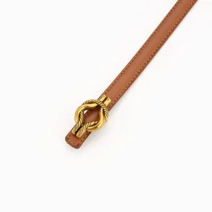 Elegant brown leather women belt with luxury gold metal knot buckle for dresses and waist styling.