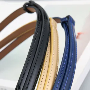 Ceinture fine en cuir minimaliste pour femme, élégante sangle de taille avec coutures.