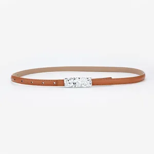 Women's slim brown leather belt with unique silver metal buckle for dresses and pants.