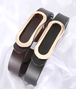 Detail view of women's stylish narrow leather belts featuring unique oval metal smooth buckles.