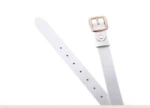 Minimalist women's leather belt with gold square buckle, stylish accessory for jeans.