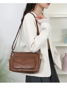 Brown multi-pocket women's shoulder bag, stylish casual crossbody bag for daily travel use.