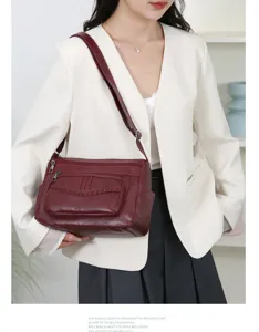Wine red multi-pocket women's shoulder bag casual stylish crossbody bag for daily travel.