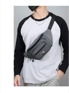 Grey nylon chest bag detail, multi-pocket design, durable strap for outdoor sports.