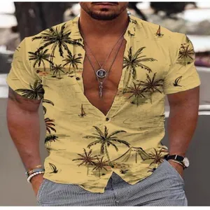 Detailed view of men's tropical palm tree print short sleeve vacation shirt in yellow.
