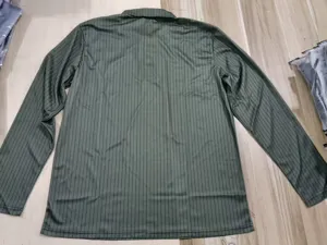 Polo à manches longues rayé vert décontracté pour hommes avec col et jolis boutons