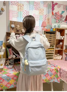 Light blue quilted backpack for women, Japanese sweet style casual school bag with cute pendant.