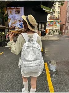 Stylish star print canvas backpack for women and students casual outdoor travel daily use.