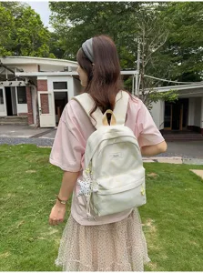 Sweet lemon yellow star backpack for school girls, fresh style Mori daily travel bag.