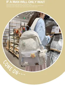 Sweet milk salt blue star embroidered backpack with cute star patches and plush doll pendant.