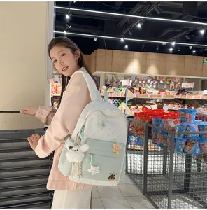 Sweet soft girl backpack with star embroidery and bear pendant, casual school bag for travel.