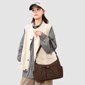 Mountain style brown plaid shoulder bag for women, casual daily shopping and outdoor travel.