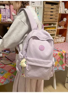 Light purple quilted casual backpack for women, sweet Japanese style school bag with front pocket.