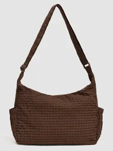 Brown checkered canvas shoulder bag with adjustable strap and side pockets for daily casual use.