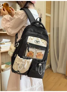 Joli sac à dos scolaire japonais noir et blanc avec poche transparente et motif d'ours.